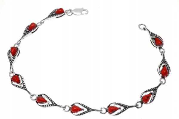Elegancka srebrna bransoletka z koralem